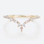 0.29ctw Rose Gold Marquise Cut Morganite Curved Wedding Band in yellow gold
