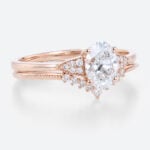 1.5ct Colorless VS+ Oval Cut Lab Grown Diamond Milgrain 4-Prong Engagement Ring Set in Rose Gold (3)