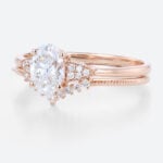 1.5ct Colorless VS+ Oval Cut Lab Grown Diamond Milgrain 4-Prong Engagement Ring Set in Rose Gold (4)
