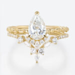 1ct Colorless VS+ Pear Shaped Lab Grown Diamond Twisted 3-Prong Engagement Ring Set in Yellow Gold