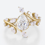 1ct Colorless VS+ Pear Shaped Lab Grown Diamond Bypass 6-Prong Engagement Ring in yellow Gold