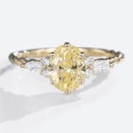1.5ct Fancy Yellow VS+ Oval Cut Lab Grown Yellow Diamond Twisted 6-Prong Engagement Ring (1)