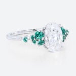 1.5ct Oval Cut Lab Diamond Engagement Ring with Lab Emerald Side Stone Ring in White Gold