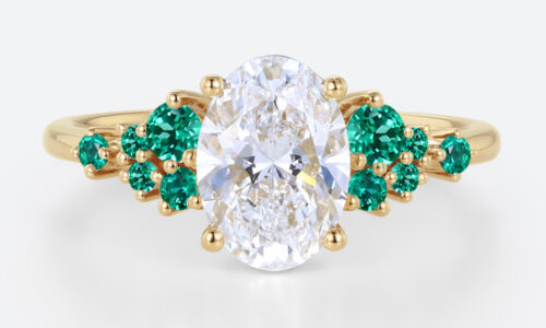 1.5ct Oval Cut Lab Diamond Engagement Ring with Lab Emerald Side Stone Ring in Yellow Gold