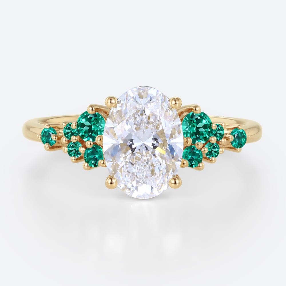 1.5ct Oval Cut Lab Diamond Engagement Ring with Lab Emerald Side Stone Ring in Yellow Gold
