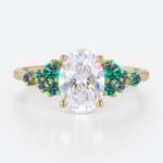 1.5ct Oval Cut Lab Diamond Engagement Ring with Lab Emerald Side Stone Ring in Rose Gold