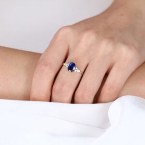 Yellow Gold Oval Cut Lab Sapphire Engagement Ring Cluster Twisted Band