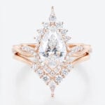 1.5ct Colorless VS+ Pear Cut Lab Grown Diamond Vintage Crossover Shank 4-Prong Bridal Ring Set in Rose Gold