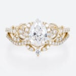1ct Colorless VS+ Pear Cut Lab Grown Diamond Vintage Cluster Infinity 4-Prong Bridal Ring Set in Rose Gold (1)