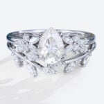 Pear Shaped Moissanite Nature-Inspired Engagement Ring Set with Curved Wedding Band