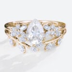 Pear Shaped Moissanite Nature-Inspired Engagement Ring Set with Curved Wedding Band (9)