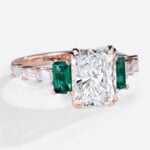 1.5 Carat Lab Diamond Double Claw Ring Emerald Side Stone in Rose Gold