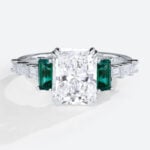 1.5 Carat Lab Diamond Double Claw Ring Emerald Side Stone in White Gold