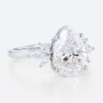 2ct Colorless VS+ Pear Cut Lab Grown Diamond Wing-Inspired 4-Prong Engagement Ring in White Gold