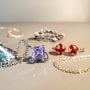 June birthstone—pearl, moonstone, alexandrite.