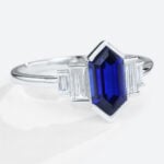 Long Hexagon Cut Lab Grown Sapphire with Moissanite Side Stone in white gold