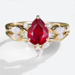 Yellow Gold 1.2ct Pear Shaped Lab Grown Ruby Ring Sets with Curved Wedding Band