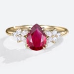 Lab Made Ruby Vintage Pear Shaped Engagement Ring Double Claw in yellow gold