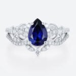 White Gold Pear Cut Lab Grown Sapphire Ring Set Pave Infinity Engagement Ring