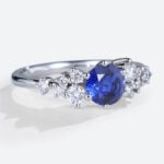 - round lab sapphire engagement ring - blue sapphire cluster bridal ring - affordable sapphire ring with moissanite accents