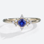 Round Cut Lab Created Blue Sapphire Rings Symmetrical Design Bridal Ring in Yellow Gold