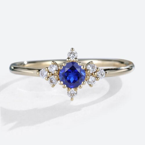 Round Cut Lab Created Blue Sapphire Rings Symmetrical Design Bridal Ring in Yellow Gold