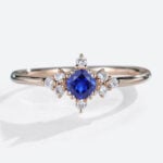 Round Cut Lab Created Blue Sapphire Rings Symmetrical Design Bridal Ring in Rose Gold
