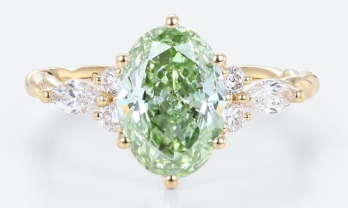1.5ct Fancy Green VS+ Oval Cut Lab Grown Green Diamond Twisted 6-Prong Engagement Ring (1) 1.5ct Oval Lab Green Diamond Ring Twisted 6-Prong Engagement Ring in Yellow Gold