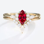 0.5ct Marquise Cut Lab Ruby Ring Set with Curved Wedding Bands in Yellow Gold