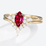 0.5ct Marquise Cut Lab Ruby Ring Set with Curved Wedding Bands in Yellow Gold