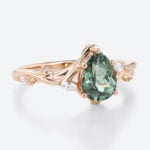 Pear Cut Green Sapphire Engagement Ring​ with Floral Vine Details in Rose Gold