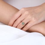 Pear Cut Green Sapphire Engagement Ring​ with Floral Vine Details in Rose Gold