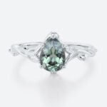 Pear Cut Green Sapphire Engagement Ring​ with Floral Vine Details in White Gold