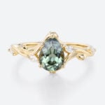 Pear Cut Green Sapphire Engagement Ring​ with Floral Vine Details in Yellow Gold