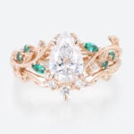1ct Pear Cut Lab Diamond Bridal Ring Set with Nature-Inspired Emerald Side Stone in Rose Gold