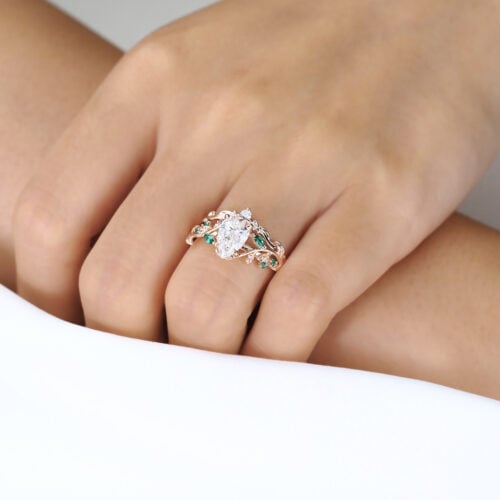 1ct Pear Cut Lab Diamond Bridal Ring Set with Nature-Inspired Emerald Side Stone in Rose Gold