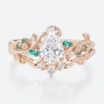 1ct Pear Cut Lab Diamond Bridal Ring Set with Nature-Inspired Emerald Side Stone in Rose Gold