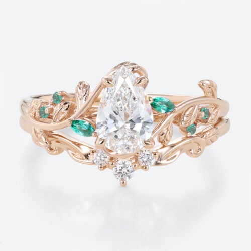 1ct Pear Cut Lab Diamond Bridal Ring Set with Nature-Inspired Emerald Side Stone in Rose Gold