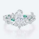 1ct Pear Cut Lab Diamond Bridal Ring Set with Nature-Inspired Emerald Side Stone in White Gold
