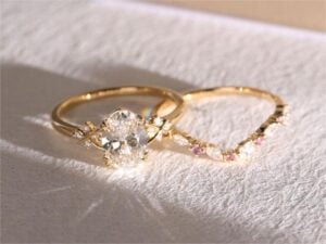 Fashion Week 1.5ct Colorless VS+ Oval Cut Lab Grown Diamond Vintage Infinity 4 Double Claw Bridal Ring Set in Yellow Gold