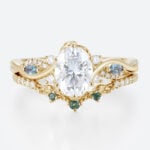 1ct Oval Moissanite Engagement Rings​ Set with Curved Leaf Band in Yellow Gold