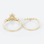 1ct Oval Moissanite Engagement Rings​ Set with Curved Leaf Band in Yellow Gold