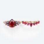 1.2ct Pear Shaped Ruby Engagement Ring Set with Curved Band in Rose Gold