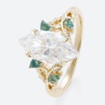 2 Carat Marquise Cut Moissanite Ring with Scrollwork Leaf Accents in Yellow Gold