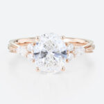 Oval Lab Grown Diamond Engagement Ring with Floral Side Stones in Rose Gold