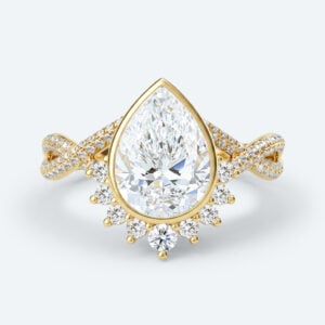 Pear Cut Lab Grown Diamond Twisting Pavé Band Bezel Setting Engagement Ring in Yellow Gold