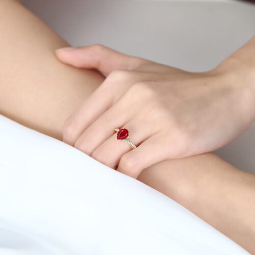 1.2ct Pear Lab Ruby Engagement Ring with Twisted Pavé Diamond Band in Yellow Gold