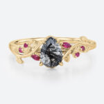 Pear Shaped Black Rutilated Quartz Botanical Ring with Ruby Accents in Yellow Gold