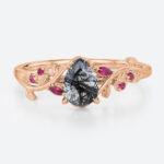 Pear Shaped Black Rutilated Quartz Botanical Ring with Ruby Accents in Rose Gold
