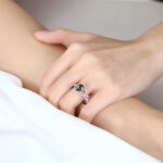 Pear Shaped Black Rutilated Quartz Botanical Ring with Ruby Accents in White Gold